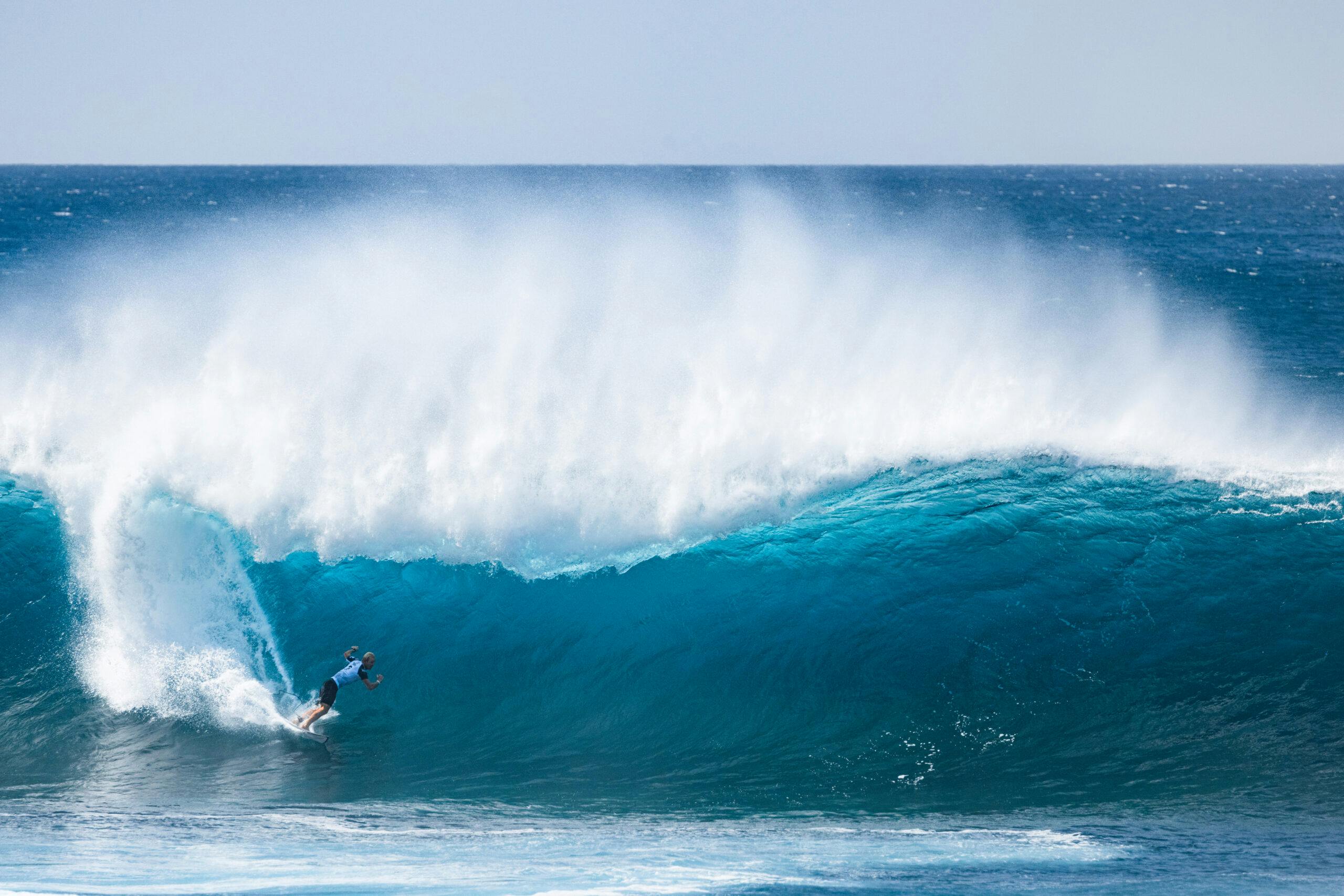 Nat Young surfing Pipeline