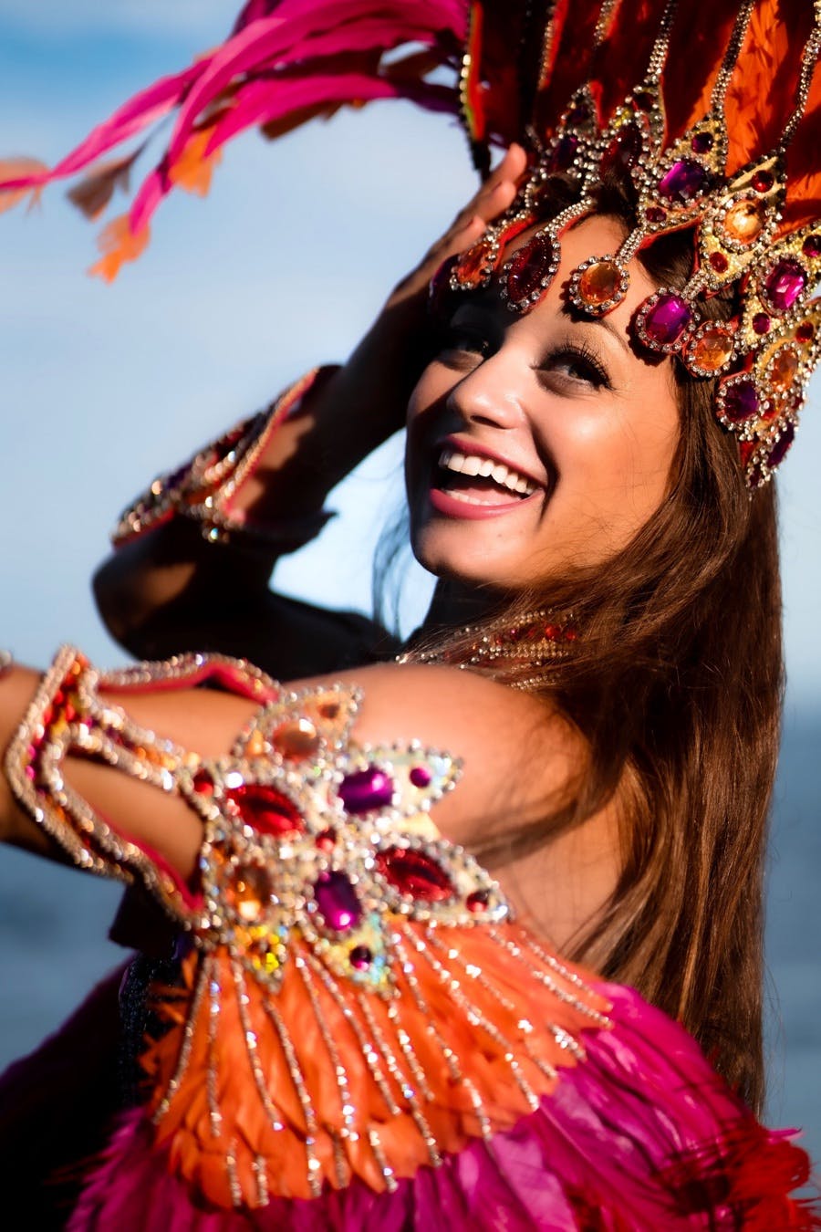 Gisella Fereirra smiles while dancing in samba attire